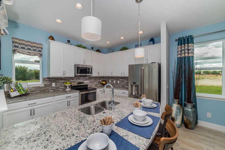 Chelsea Park at West Haven. Disney vacation homes for sale kitchen and breakfast bar